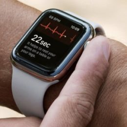 man performing an ecg on apple watch 4